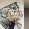 Bolsa de Mão Casual Elegante Shuai Mijia Cor Sólida para Mulheres 2026 Verão Nova Bolsa Quadrada Pequena para o Dia a Dia Bolsa Transversal Simples