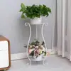 Soporte de flores de hierro forjado, estilo europeo, de pie, estante para macetas de interior de varios niveles para sala de estar y balcón, adecuado para plantas en maceta como plantas araña y plantas en maceta.