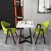 Mesa y sillas de reunión de estilo nórdico, moda italiana, lujo ligero; mesa de recepción y negociación de negocios de alta gama, mesa de ocio para patio
