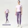Conjunto deportivo de dos piezas de secado rápido y transpirable para mujer, con diseño cruzado en la espalda, manga corta, cintura alta y efecto moldeador de glúteos, adecuado para correr y yoga