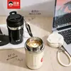 Nuevo termo para café al vacío 7153 de Kuangdi, hecho de acero inoxidable 316, con tapa y diseño de doble sorbo, disponible para venta al por mayor con grabado láser.