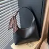 2025 Bolsa de Axila Feminina Nova Tendência Moda Versátil Bolsa de Ombro Nicho Bolsa de Mão para o Dia a Dia