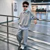 Roupa Infantil Meninos Conjunto de Terno para Primavera e Outono com Gola Camisa Estilo Coreano Lindo Estilo Moderno Conjunto de Duas Peças Roupas Infantis Médias e Grandes Comércio Exterior