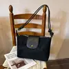Bolso de mano elegante estilo francés transfronterizo, nueva colección verano 2026, moda de principios de otoño, bolso de hombro chic, bolso cruzado