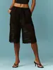 Pantalones de pierna ancha de encaje negro de longitud media para mujer, superventas transfronterizos europeos y americanos, con cintura elástica, cordón, tejido transparente y un diseño sexy estilo resort