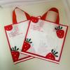 Linda bolsa de tienda de ropa con cara sonriente, bolsa de regalo, tienda de ropa para niños y niñas, bolsa de plástico portátil, embalaje de caja de zapatos, logotipo al por mayor