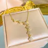 Collar de Acero de Titanio con Borla de Diamantes Completos de Trébol de Seis Hojas para Mujer, Incrustado con Circonita, Exquisita y Lujosa Cadena para Clavícula, Joyería de Lujo Ligero