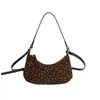 Versión Coreana Bolso de Mano de Estampado de Leopardo de Nicho Bolso Dumpling para Mujer Otoño 2025 Nuevo Retro Mate Lujo Ligero Bolso de Hombro Cruzado