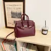 Elegante bolso de trabajo de color liso de gran capacidad, bolso cruzado, estilo popular en línea, bolso de mano versátil para mujer, disponible en stock