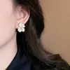 "Flores do Rio Esquecido" Brincos Florais Versáteis Estilo Francês para Mulheres, Design de Nicho com Toque de Luxo, Novos Brincos e Tarraxas Populares