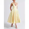 Vestido largo jacquard de cuello halter en V transfronterizo europeo y americano, vestido de noche de alta gama, elegante sin mangas de verano/primavera, espalda descubierta, entallado en la cintura