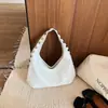 Bolso vintage grande para mujer, nuevo de verano 2026, bolso versátil de hombro y axila con remaches, adecuado para el trabajo y los desplazamientos, bolso de albóndiga