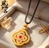 Joyería de colgante tradicional de trébol de cuatro hojas giratorio bañado en oro y con incrustaciones de diamantes, colgante de vajra de doble cara con incrustaciones de diamantes de nuevo estilo chino al por mayor
