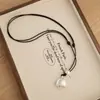 Collar Largo Estilo Coreano Ins Corazón Plateado con Cascabel y Cordón Negro para Mujer, Cadena para Clavícula Simple Versátil de Lujo Ligero Nicho