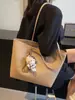 Bolsa casual transfronteiriça de grande capacidade, nova bolsa tote estilosa e minimalista para mulheres, adequada para o trabalho e o trajeto diário, bolsa de ombro e bolsa de axila