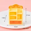 Estante de livros com simulação de paisagem em miniatura, móveis multicoloridos para casa de bonecas, armário de cozinha, armário de jantar, estante, ornamentos de resina DIY atacado