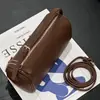 Bolsa de Almofada Simples Portátil Personalizada pelo Fabricante Bolsa de Mão Versátil na Moda Bolsa de Couro Genuíno para Canetas Transfronteiriça Atacado para Mulheres