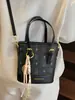 Versão Coreana da Nova Bolsa de Balde Portátil de Moda Clássica Estampada de Alta Qualidade, Bolsa Transversal de Temperamento Nicho para Mulheres Estilo Comutador