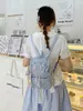 Mochila de almacenamiento a cuadros minimalista estilo coreano 2026 nuevo diseño de nicho para niñas, mochila ligera con cordón para el día a día