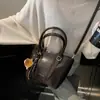 Bolso de Mano de Alta Gama para Mujer 2026 Nuevo Popular Retro Piel Suave Bolso Cubo de Hombro Versátil Bolso Cruzado para el Trabajo