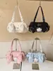 Bolsa de Ombro Feminina Nova Moda Outono 2026 Orelhas de Coelho para Axila Bolsa de Grande Capacidade Estilo Universitário Versátil