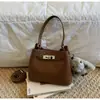 Bolsas Retro de Nicho de Alto Padrão Transfronteiriças para Mulheres Nova Coleção Primavera 2026 Versátil Casual Bolsa Transversal Bolsa de Mão Bolsa Saco