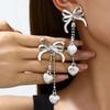 Brincos Europeus e Americanos Transfronteiriços Doces e Cool com Laço de Diamante e Franja para Mulheres Estilo Ins Brincos com Corrente de Metal e Pingente em Forma de Coração