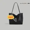 Bolso de hombro versátil de alta gama para mujer, modelo nuevo 2026, de gran capacidad y diseño sencillo, para el uso diario y el trayecto casual.