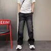 2026 Original Más Vendido Invierno Tendencia Marca Versátil Lavado Holgado Harem Recto Azul Jeans Casuales para Hombre