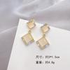 Aretes de piedra ojo de gato moda alto sentido diseño de personalidad dulce verano red de celebridades con fabricantes de aretes de aguja de plata venta al por mayor