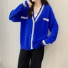 Nuevo cárdigan suéter de cachemira de invierno de corte holgado con bordes de color block, elegante y talla única para mujer