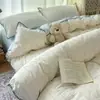 Juego de cuatro piezas con borde acolchado de algodón 100% Clase A, funda de edredón y sábana de algodón puro estilo Ins fresca y juvenil, ropa de cama para todas las estaciones
