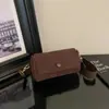 Bolsa feminina de luxo, nicho, nova coleção outono 2026, estilo retro Melard, bolsa de ombro para o dia a dia com alça larga, bolsa transversal