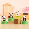 Nueva caja ciega giratoria de pandas, con adorables figuras de pandas, juguetes coleccionables de moda y lindos adornos de escritorio, disponibles para venta al por mayor