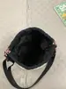 Bolso cruzado distintivo de marca popular, con cordón, versátil, para teléfono móvil, bolso tipo cubo deportivo ligero, bolso de hombro casual