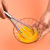 Mango de acero inoxidable batidor de huevos de silicona dispensador manual de crema batidora de líquido de huevo y queso crema venta al por mayor de fábrica