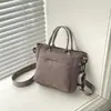 Bolsa de Tecido de Nylon Simples Transfronteiriça para Mulheres 2026 Versão Coreana Nova Bolsa de Mão de Grande Capacidade Bolsa de Ombro Transversal Bolsa Tote