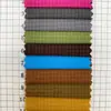 En stock, tela a cuadros blanca de nailon-poliéster de 0,25 denier, suave y amigable con la piel, tela a cuadros teñida de nailon clásica y moderna para pantalones