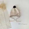 Gorro de Bebé Lindo con Bola de Pelo Estilo Coreano Otoño e Invierno Estilo Nuevo Protección para Orejas Cálido Cortavientos con Cordones Gorro de Lana para Niños y Niñas