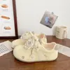 Zapatillas versátiles de estilo alemán para mujer, modelo nuevo primavera y otoño 2026, de suela plana, elegantes, casuales, para ir al trabajo, zapatos puff blancos para mujer