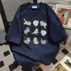 Camiseta de Manga Curta com Estampa de Gato Graffiti Design de Nicho para Mulheres Verão 2026 Nova Casual Solta Roupa de Trabalho Top