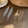 Pendientes minimalistas de plata con aguja, diamantes y borlas, que ofrecen un lujo ligero y una sensación de alta gama, elegantes y sencillos, versátiles y elegantes.