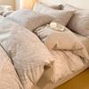 Juego de cuatro piezas de algodón cepillado grueso para otoño e invierno Algodón clase A Sábanas de cama Funda de edredón Juego de tres piezas Ropa de cama textil para el hogar de Nantong