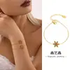 Pulseira Floco de Neve de Natal Xinyixin Feita à Mão com Zircônia Super Brilhante Inlaid Banhada a Ouro 18K Aço Titânio Joias para Mulheres
