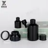 Botella de aceite esencial negro Spot 120ml set de botellas cosméticas botella de aceite esencial botella de crema botella de loción botella de vidrio de hombro inclinado