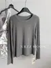 Camiseta de manga larga con cuello redondo, estilo minimalista, para mujer, otoño 2026, básica, corte holgado, adelgazante, versátil, disponible en varios colores