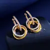 Suministro en vivo de fábrica tres colores tres anillos tarjeta de collar diseño de moda para el hogar diamante colgante redondo cadena para la clavícula