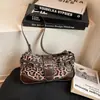 Bolsa de Ombro Estampada de Leopardo para Mulheres Nova Tendência Retro Primavera 2026 Bolsa de Axila Versátil Bolsa Transversal Bolsa de Moda de Alta Qualidade