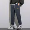 Pantalones casuales de pana para hombre, nuevo estilo otoño 2025, pantalones jogger versátiles para primavera y otoño, pantalones deportivos para hombre con cintura elástica
