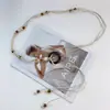 Cuerda de cintura bohemia trenzada vintage con decoración de estilo étnico para falda Cinturón de verano nuevo Cadena de cintura simple para la cintura